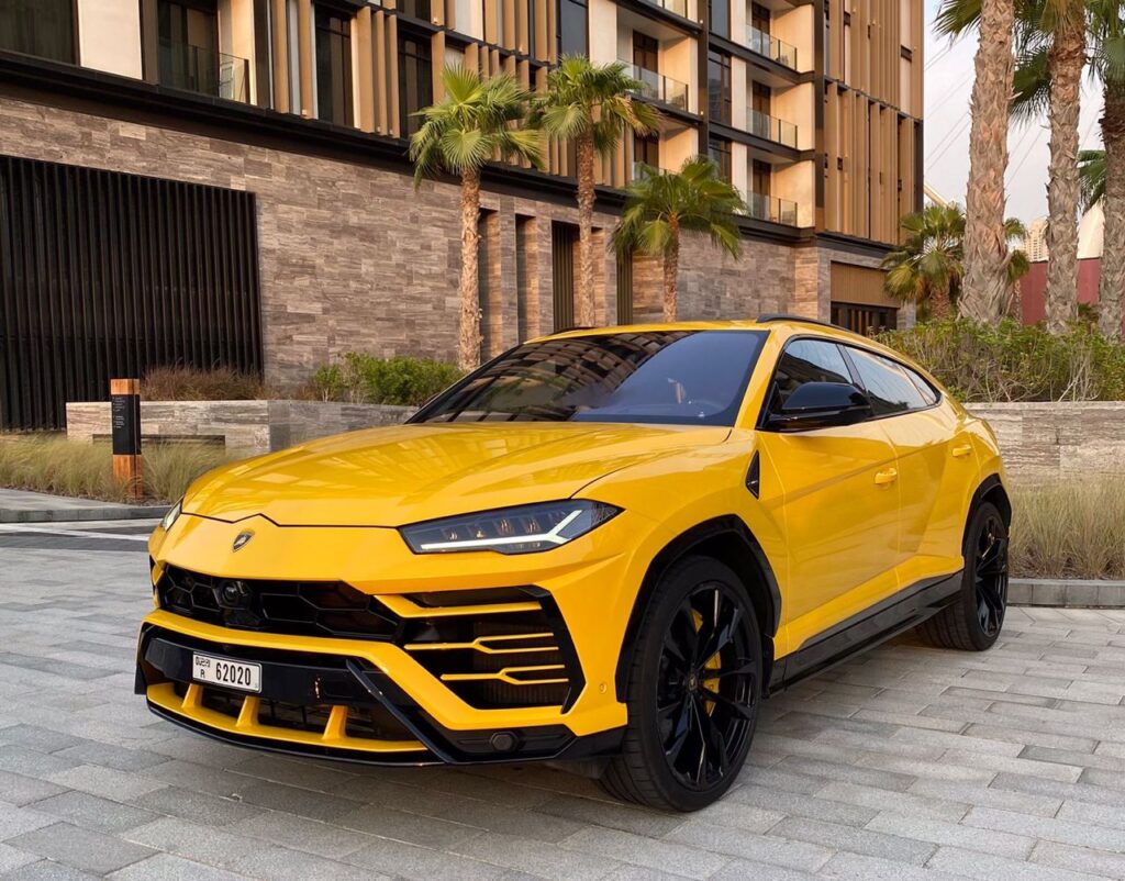 Car Rental Service in Dubai renting a Lamborghini Urus in Dubai
